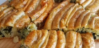 Ispanaklı Börek: Geleneksel Lezzetin Modern Sunumu Ispanaklı börek, hem kahvaltı sofralarının hem de özel davetlerin vazgeçilmez lezzetlerinden biridir. İncecik açılmış yufkaların arasında yer alan ıspanak, böreğe hem doğal bir renk hem de zengin bir besin değeri katar. Ispanaklı börek, özellikle ev yapımı olduğunda, hem lezzet hem de sağlık açısından sofralara değer katar. Bu yazımızda ıspanaklı böreğin tarihçesinden malzeme seçimlerine, hazırlık aşamalarından pişirme tekniklerine kadar detaylı bilgiler bulabilirsiniz. Konulu bir haber görseli.