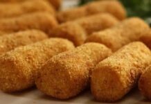 Patates kroket, özellikle Avrupa mutfağında uzun bir geçmişe sahip olan, çıtır dış yüzeyi ve yumuşak iç dokusuyla öne çıkan bir atıştırmalıktır. İsmi Fransızca “croquette” kelimesinden gelir ve bu tür atıştırmalıkların altın sarısı, çıtır dış kaplamasıyla tanınması, lezzetinin simgesi haline gelmiştir. Konulu bir haber görseli.